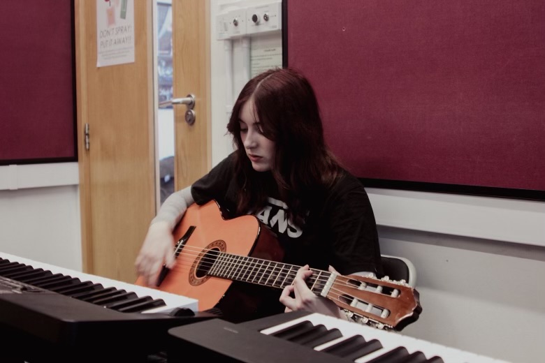 April and Lucien photographed in a rehearsal space