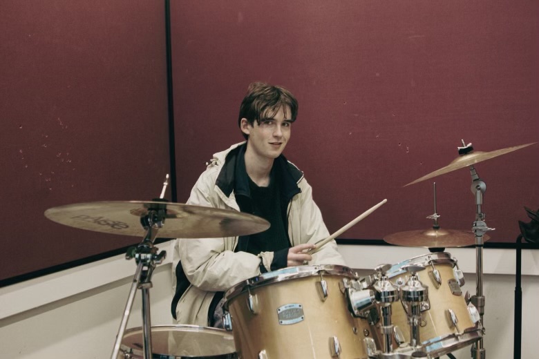 April and Lucien in a candid band photograph
